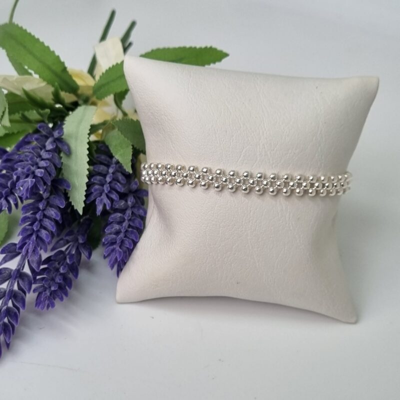 Pulsera plata, diseño tejida elástica 3 hilos, talla 19